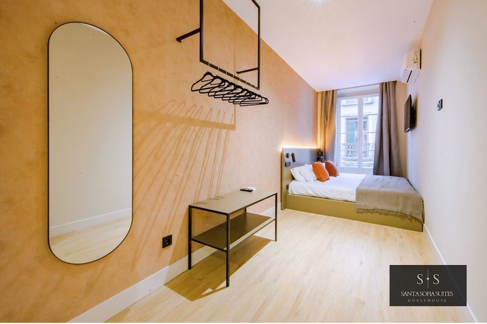 Imagen de la habitación del Hotel Santa Sofia Suites. Foto 5
