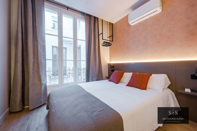 Imagen de la habitación del Hotel Santa Sofia Suites. Foto 7