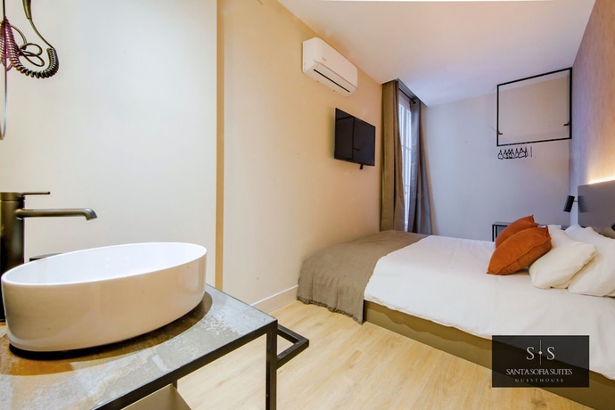 Imagen de la habitación del Hotel Santa Sofia Suites. Foto 11