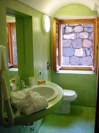 Imagen de la habitación del Hotel Santa Teresa Azienda Agricola. Foto 15