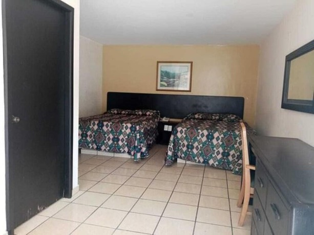 Imagen de la habitación del Hotel Santander Inn and Suites. Foto 5