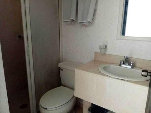 Imagen de la habitación del Hotel Santander Inn and Suites. Foto 6