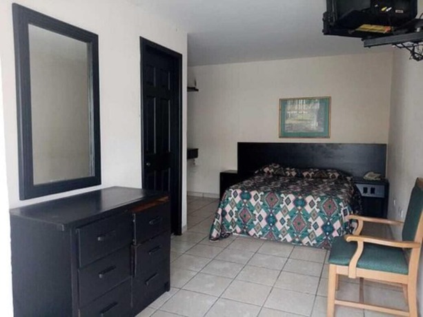 Imagen de la habitación del Hotel Santander Inn and Suites. Foto 7