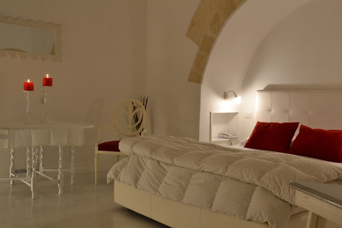 Imagen de la habitación del Hotel Sant'angelo Luxury Resort. Foto 8