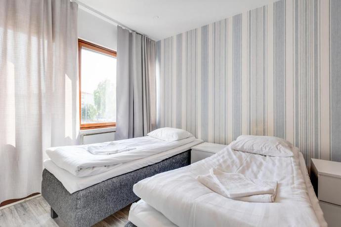 Imagen de la habitación del Hotel Santa's Holiday Homes. Foto 9