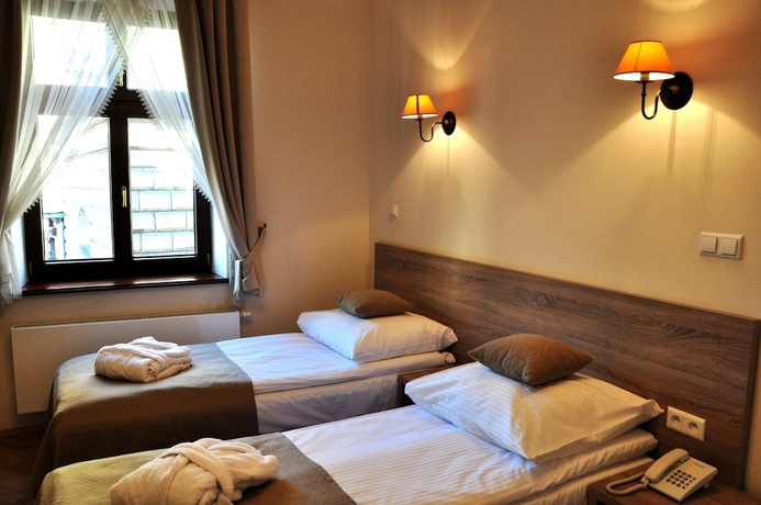 Imagen de la habitación del Hotel Santi, Cracovia. Foto 7