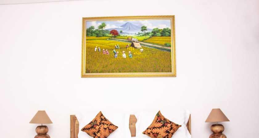 Imagen de la habitación del Hotel Santi HomeStay. Foto 2