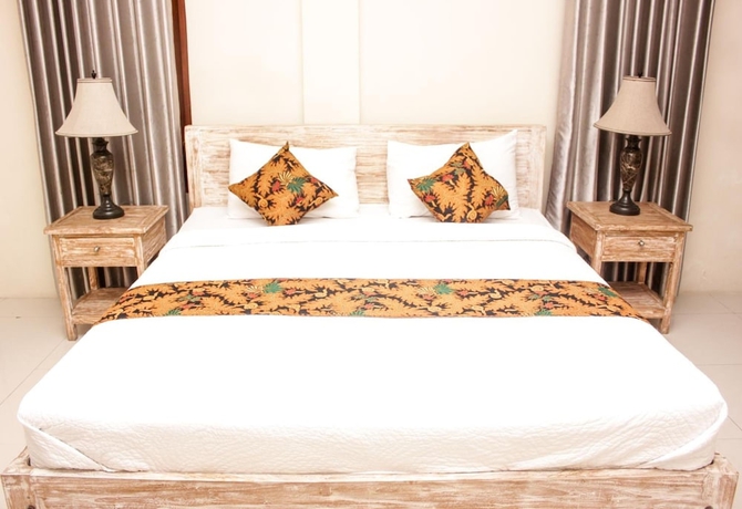 Imagen de la habitación del Hotel Santi HomeStay. Foto 5