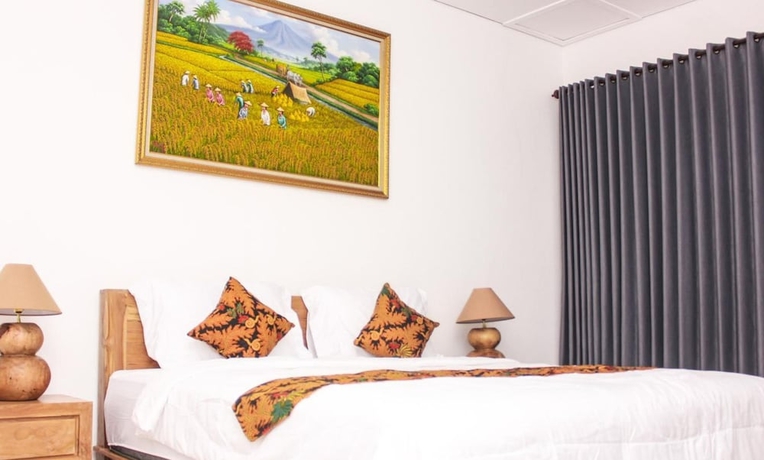 Imagen de la habitación del Hotel Santi HomeStay. Foto 7