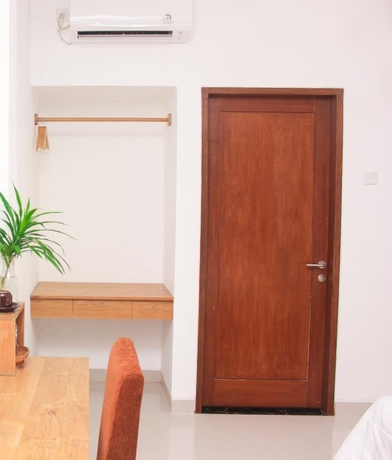 Imagen de la habitación del Hotel Santi HomeStay. Foto 8