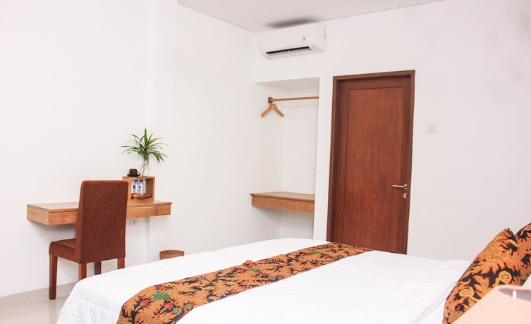 Imagen de la habitación del Hotel Santi HomeStay. Foto 15