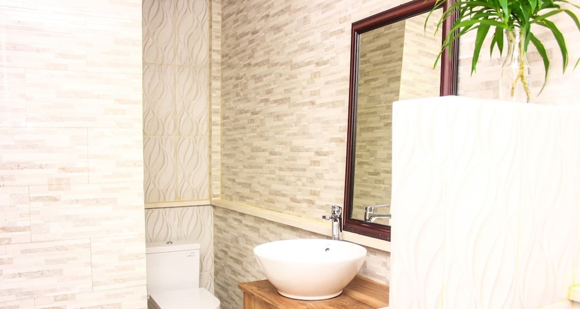 Imagen de la habitación del Hotel Santi HomeStay. Foto 16