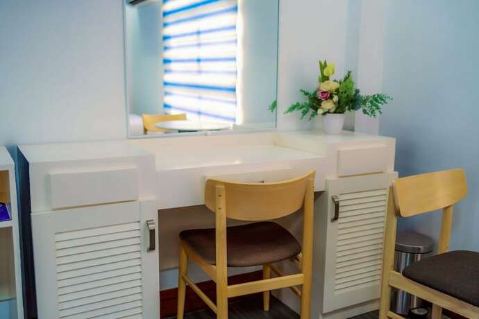 Imagen de la habitación del Hotel Santiago Cove And Restaurant. Foto 13