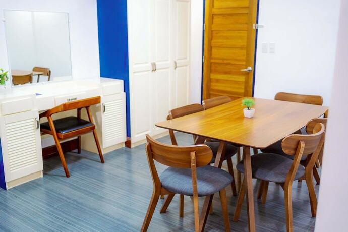 Imagen de la habitación del Hotel Santiago Cove And Restaurant. Foto 16