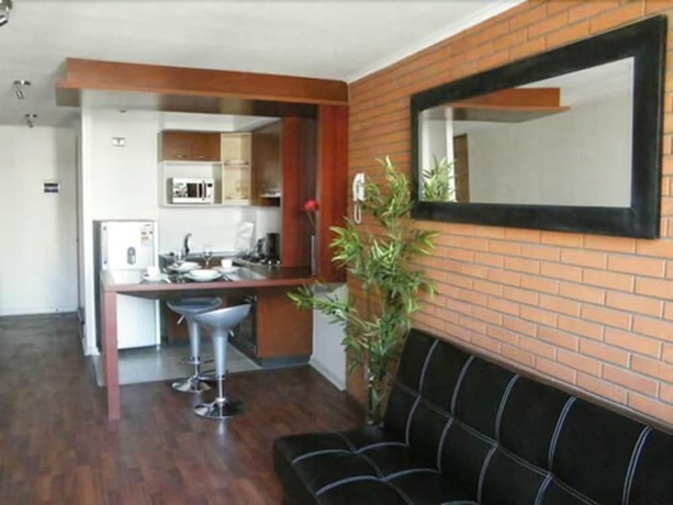 Imagen de la habitación del Hotel Santiago Suite Apartment. Foto 4