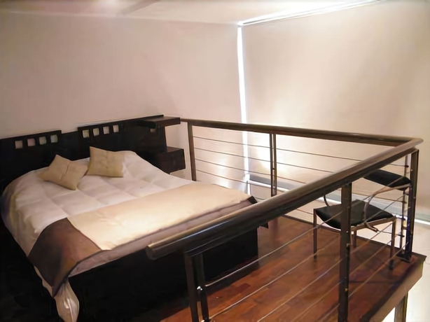 Imagen de la habitación del Hotel Santiago Suite Apartment. Foto 11