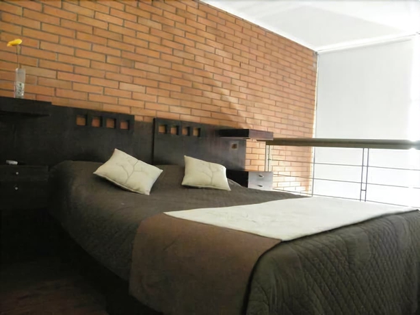 Imagen de la habitación del Hotel Santiago Suite Apartment. Foto 13