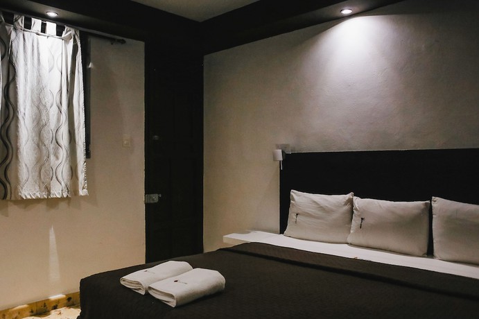 Imagen de la habitación del Hotel Santiago Trinidad. Foto 10