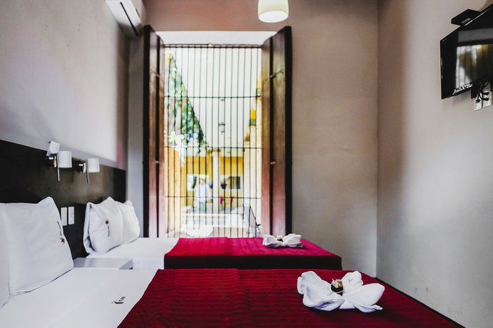 Imagen de la habitación del Hotel Santiago Trinidad. Foto 11