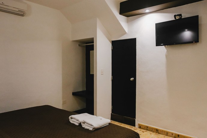 Imagen de la habitación del Hotel Santiago Trinidad. Foto 12