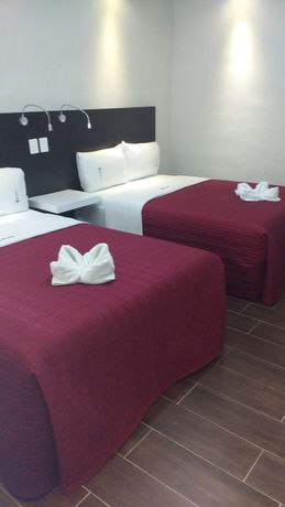 Imagen de la habitación del Hotel Santiago Trinidad. Foto 14