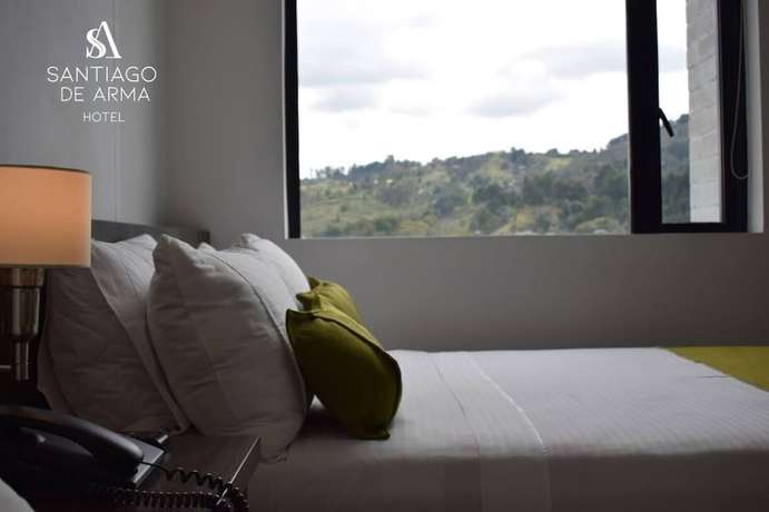 Imagen de la habitación del Hotel Santiago de Arma. Foto 15