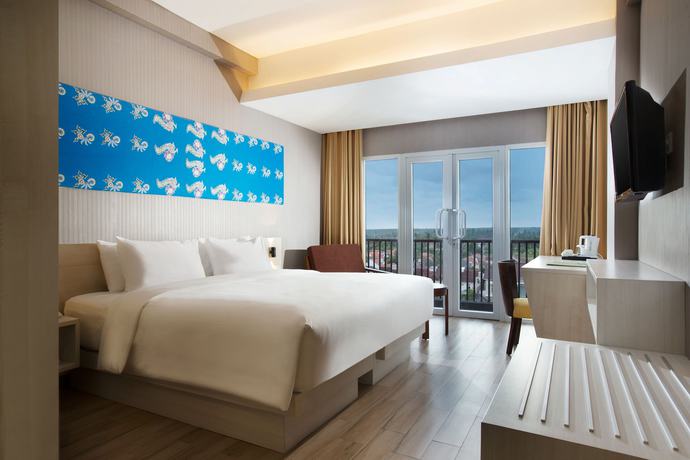 Imagen de la habitación del Hotel Santika Banyuwangi. Foto 7