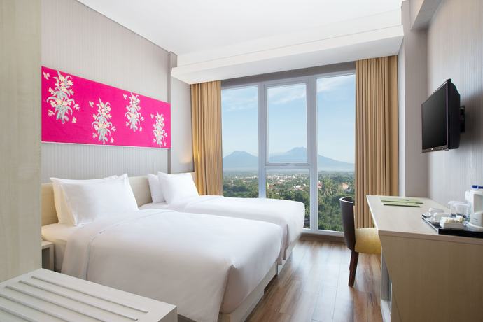 Imagen de la habitación del Hotel Santika Banyuwangi. Foto 8