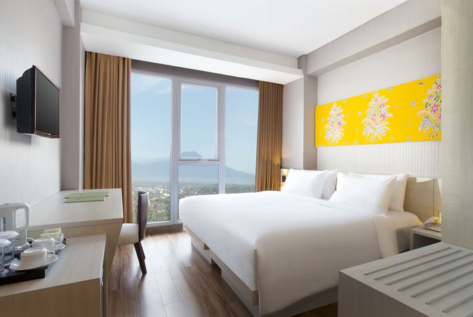 Imagen de la habitación del Hotel Santika Banyuwangi. Foto 9