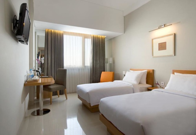 Imagen de la habitación del Hotel Santika Jemursari. Foto 7