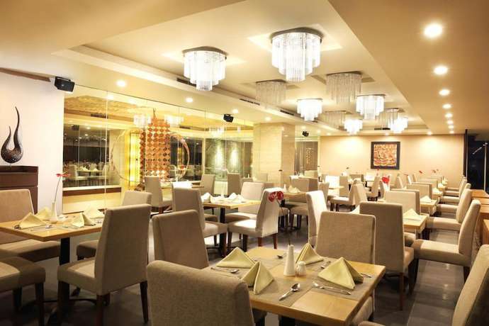 Imagen del bar/restaurante del Hotel Santika Premiere Gubeng - Surabaya. Foto 3