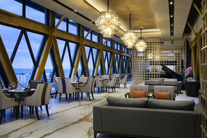 Imagen del bar/restaurante del Hotel Santika Premiere Padang. Foto 9