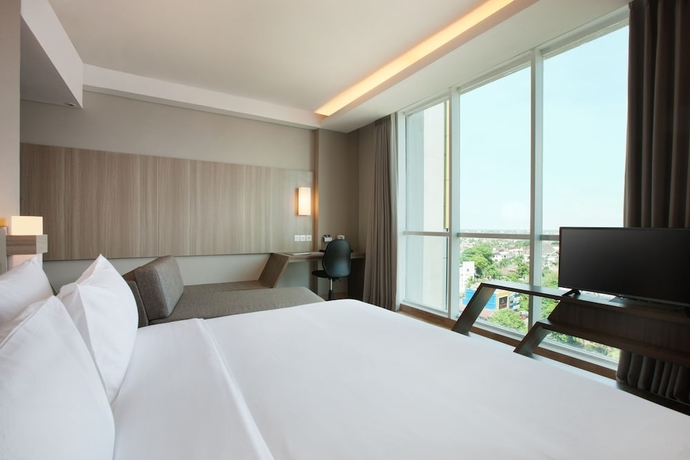 Imagen de la habitación del Hotel Santika Radial Palembang. Foto 4