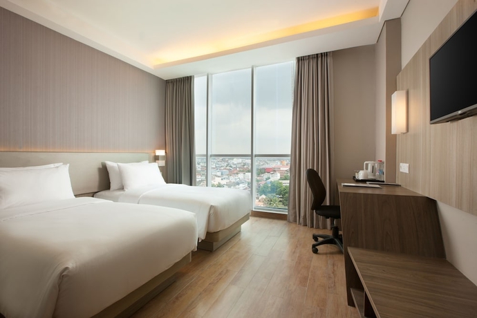 Imagen de la habitación del Hotel Santika Radial Palembang. Foto 7