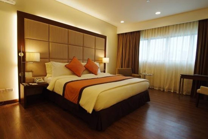 Imagen de la habitación del Hotel Santomas Suites. Foto 4