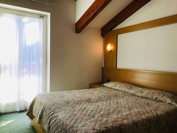 Imagen de la habitación del Hotel Santoni. Foto 7
