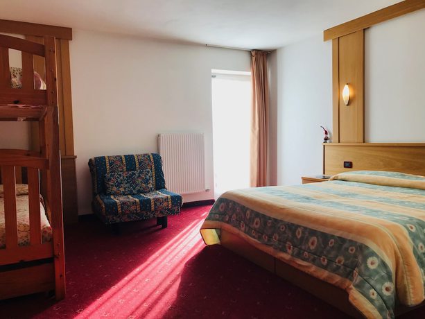 Imagen de la habitación del Hotel Santoni. Foto 10