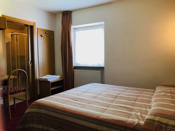 Imagen de la habitación del Hotel Santoni. Foto 12