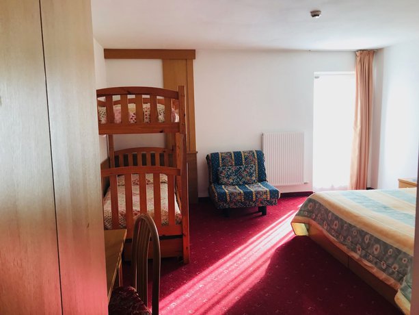 Imagen de la habitación del Hotel Santoni. Foto 13