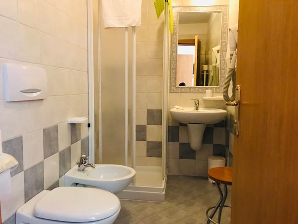 Imagen de la habitación del Hotel Santoni. Foto 14