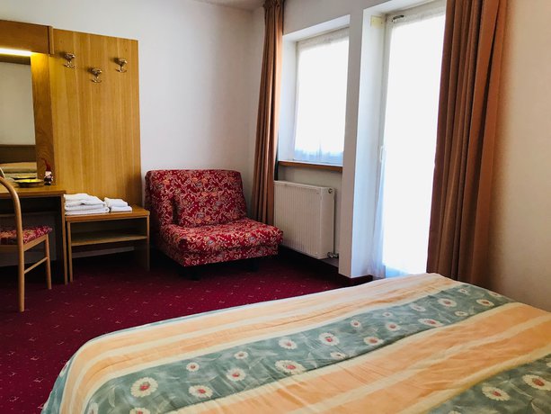 Imagen de la habitación del Hotel Santoni. Foto 15