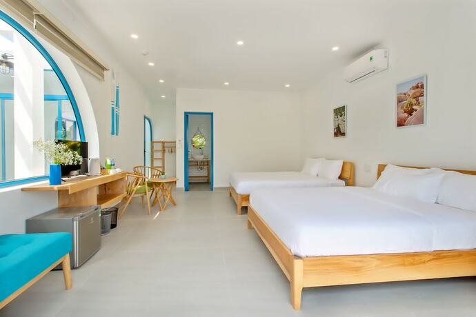 Imagen de la habitación del Hotel Santorin Hoian Villa. Foto 12