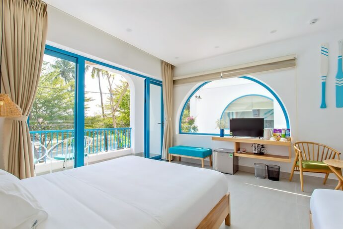 Imagen de la habitación del Hotel Santorin Hoian Villa. Foto 30