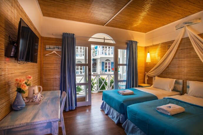 Imagen de la habitación del Hotel Santorini Beach Resort. Foto 15