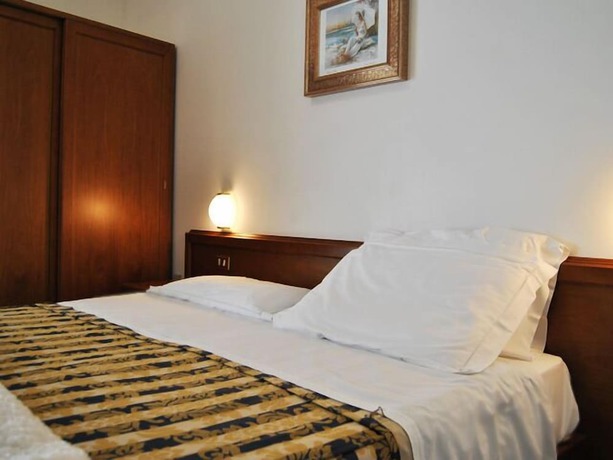 Imagen de la habitación del Hotel Santorotto. Foto 15