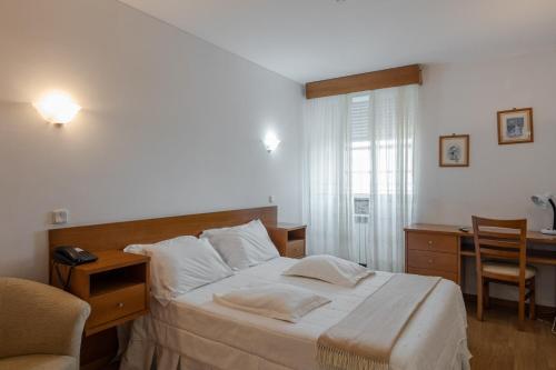 Imagen de la habitación del Hotel Santos, Guarda. Foto 8