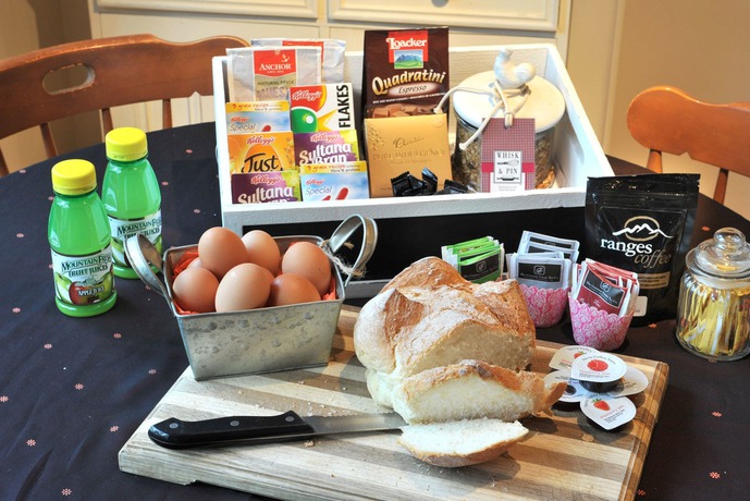 Imagen del bar/restaurante del Hotel Santosa Cottage. Foto 6