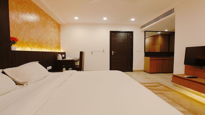 Imagen de la habitación del Hotel Santosh Dham. Foto 13