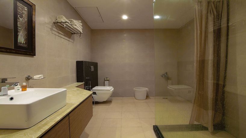 Imagen de la habitación del Hotel Santosh Dham. Foto 16