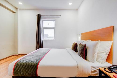 Imagen de la habitación del Hotel Santosh Palace. Foto 18